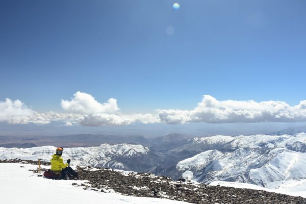 Seating on the top of Central High Atlas, with a view on Grand Erg Occidental, beginning of the Sahara desert